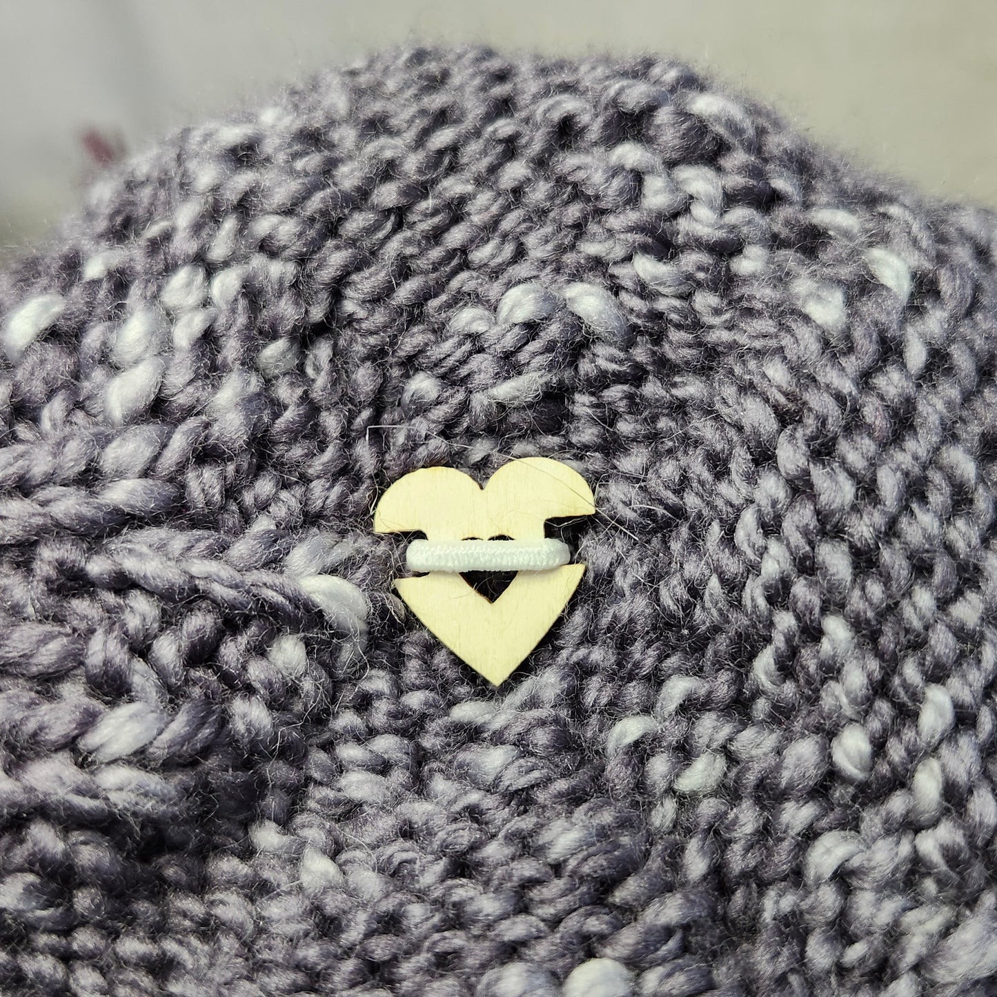 Pompon gris argenté