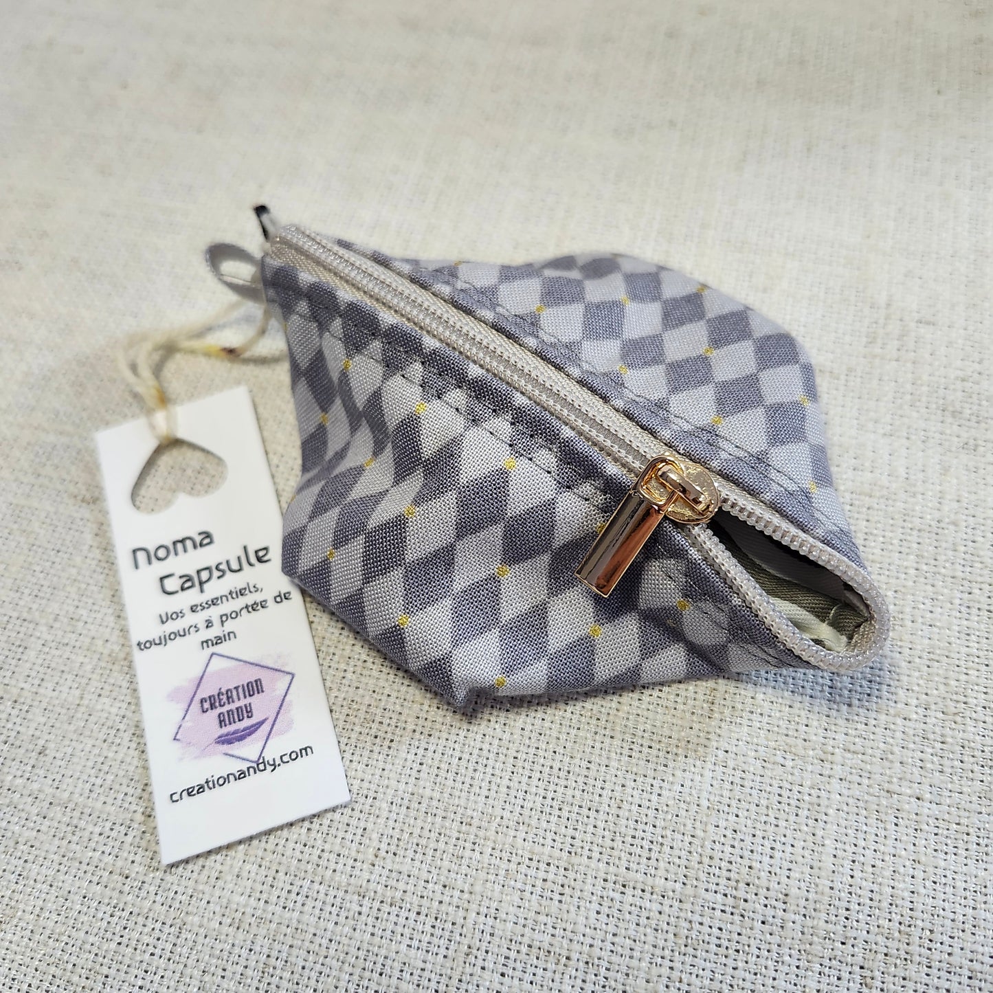 Noma Capsule - Damier gris
