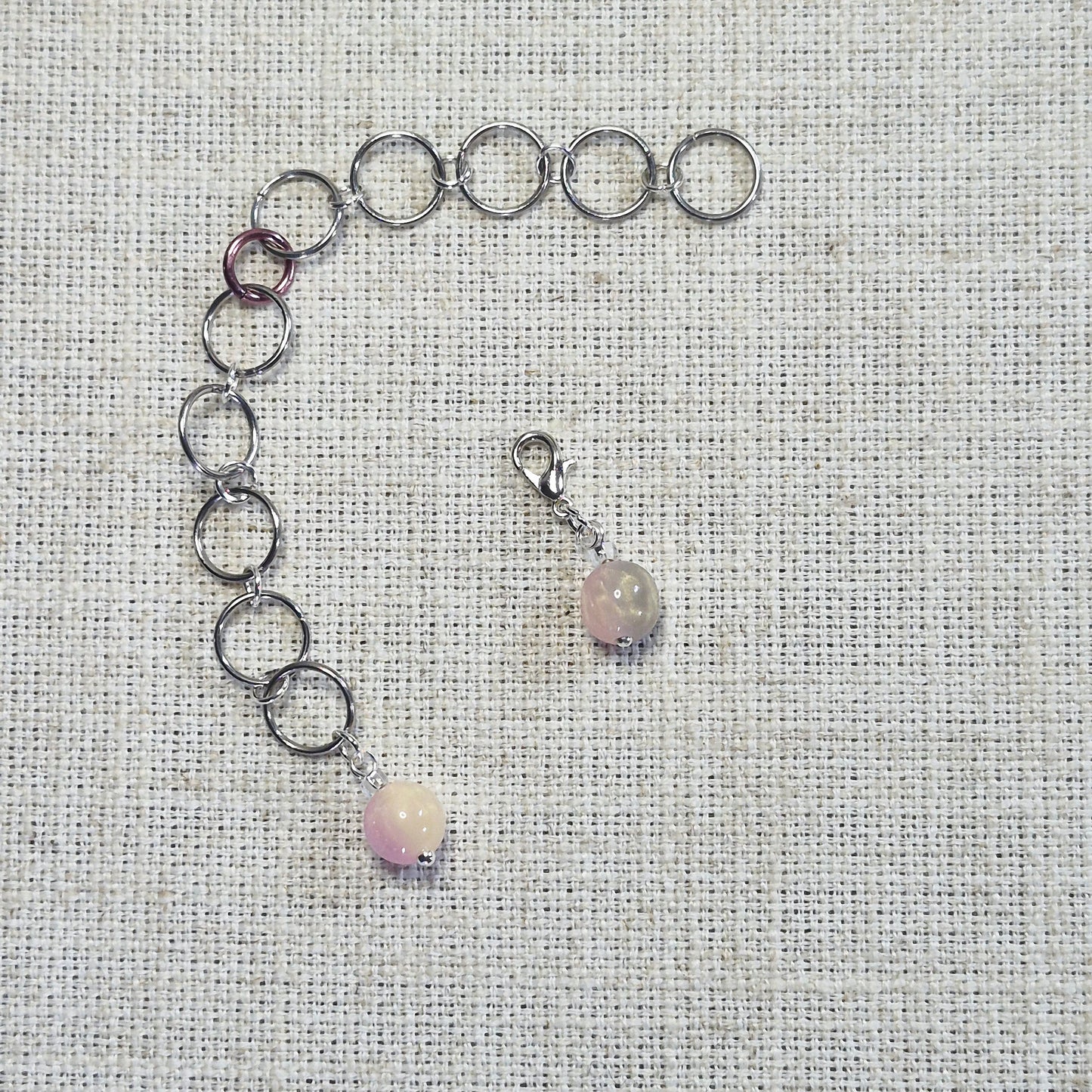 Compteur de rangs 10mm - Œil de chat rose rêveuse