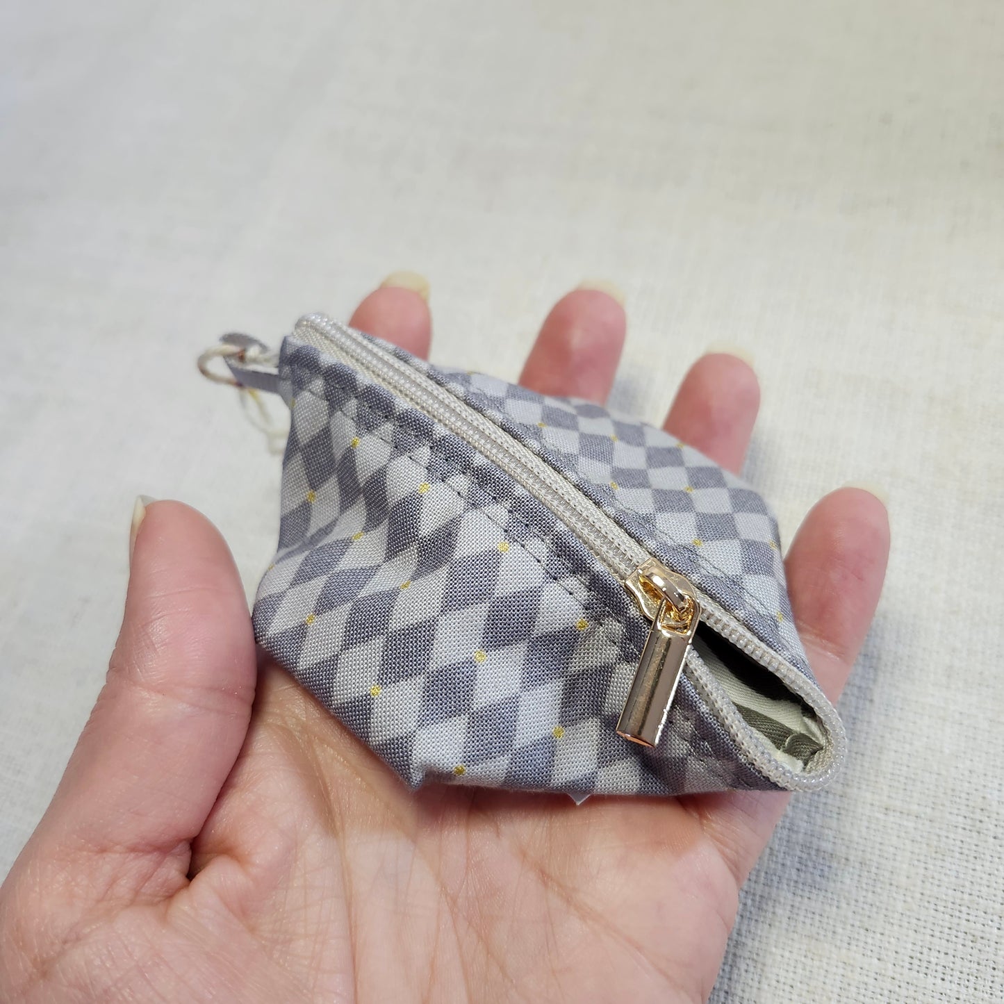 Noma Capsule - Damier gris