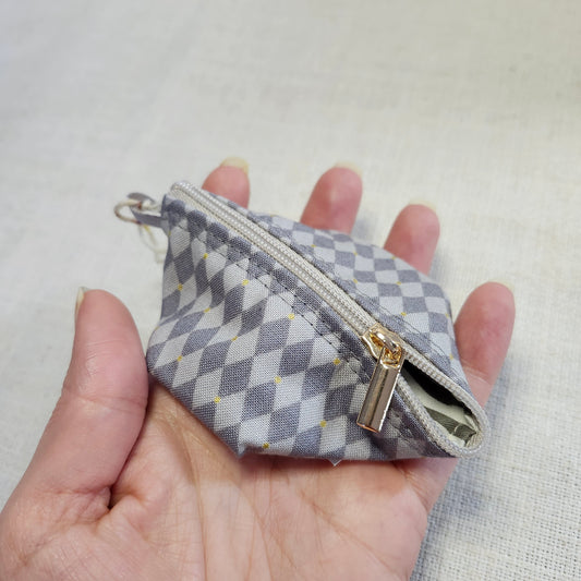Noma Capsule - Damier gris