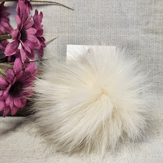Pompon beige