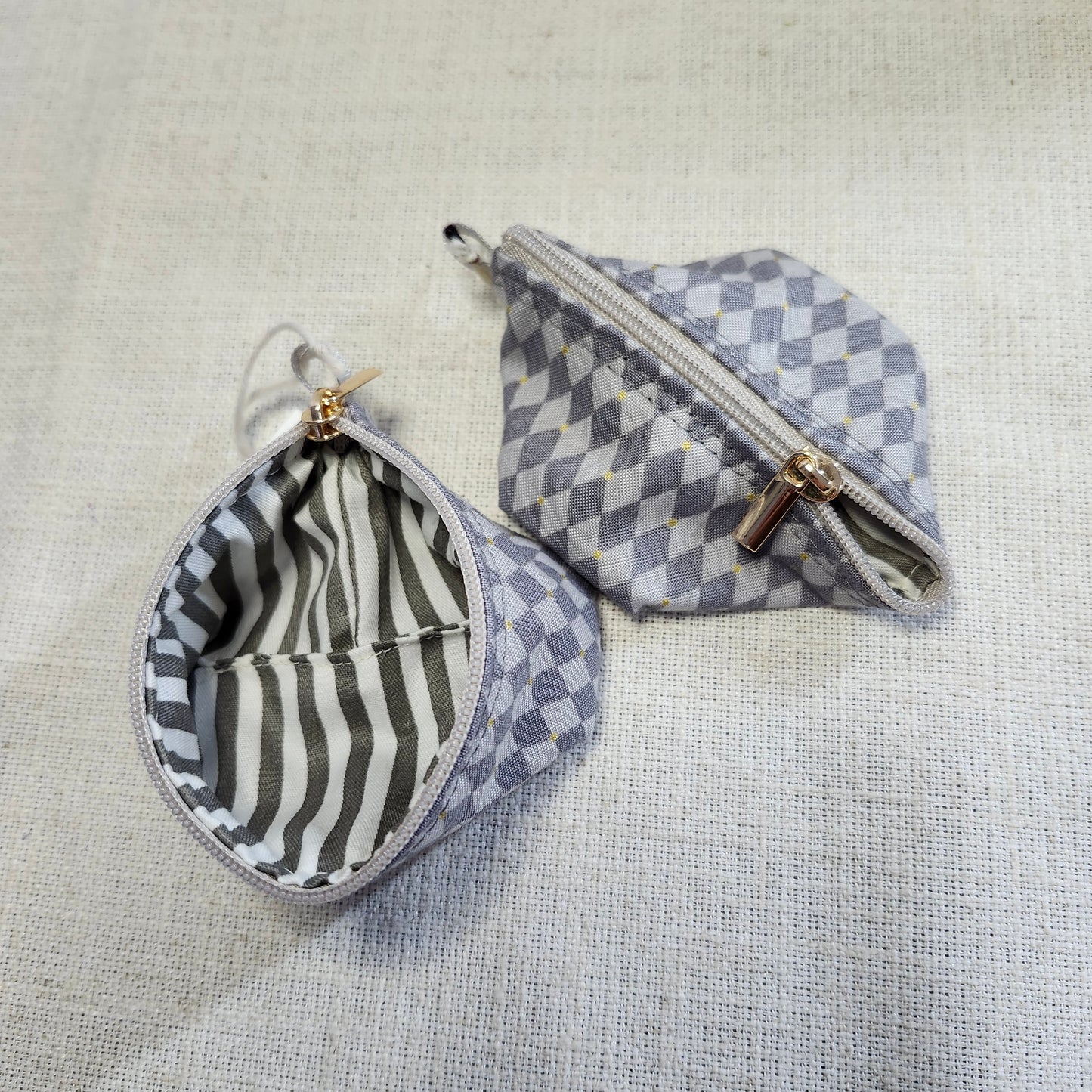 Noma Capsule - Damier gris