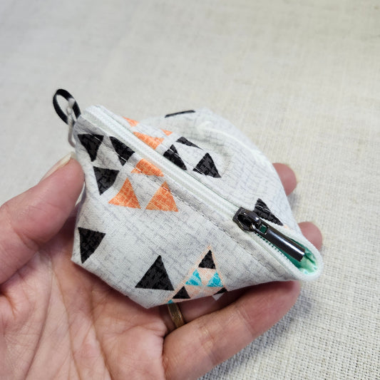 Noma Capsule - Triangles pastels